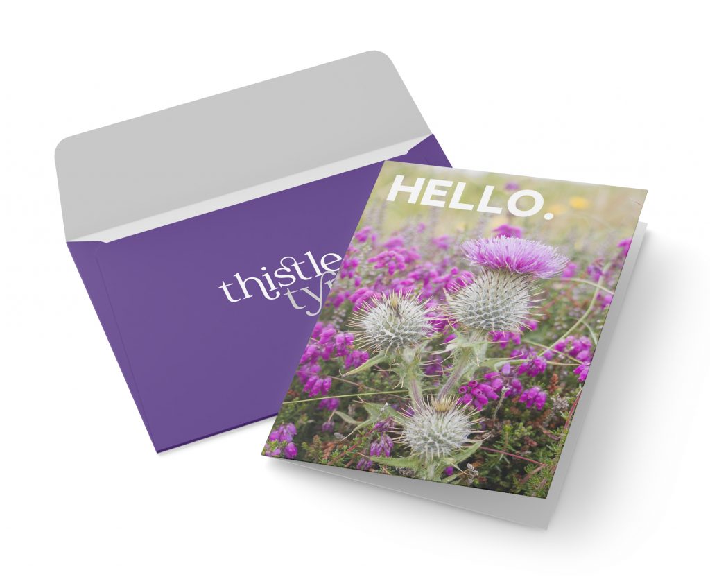 Thistle Type branding on stationery.